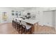 Spacious kitchen with a large center island, stainless appliances and light colored cabinets offering a modern aesthetic at 260 Curling Creek Dr # 235P, Clayton, NC 27527