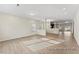 Spacious living room with natural light, hardwood floors, and an open layout great for entertaining at 260 Curling Creek Dr # 235P, Clayton, NC 27527