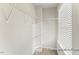 Walk-in closet with carpet and shelving, offering ample storage space and organization options at 260 Curling Creek Dr # 235P, Clayton, NC 27527