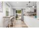 Bright kitchen with stainless steel appliances, subway tile backsplash and a breakfast nook at 2746 Saint Lukes Church Rd, Goldston, NC 27252