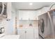 Bright kitchen featuring stainless steel appliances and white subway tile backsplash at 2746 Saint Lukes Church Rd, Goldston, NC 27252