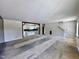 Bright open living space flows into the unfinished kitchen, offering a great layout for future updates and customization at 2802 Packing Plant Rd, Smithfield, NC 27577