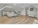 Bonus room featuring a large couch and inversion table at 296 Shoreline Dr, Princeton, NC 27569