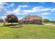Spacious, well-maintained home with large lawn and detailed landscaping at 296 Shoreline Dr, Princeton, NC 27569