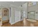 Spacious foyer with a view of the staircase and access to other rooms in the home at 296 Shoreline Dr, Princeton, NC 27569