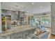 Beautiful kitchen with granite countertops, pendant lighting, and a cozy breakfast nook with lots of light at 296 Shoreline Dr, Princeton, NC 27569
