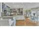 Beautiful kitchen with stone countertops, an island, a breakfast nook, and stainless steel appliances at 296 Shoreline Dr, Princeton, NC 27569