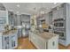 Beautiful kitchen with stainless steel appliances, granite countertops, kitchen island, and custom cabinets at 296 Shoreline Dr, Princeton, NC 27569
