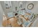 Airy living room with fireplace, large windows, and stylish decor at 296 Shoreline Dr, Princeton, NC 27569