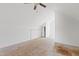 Attic space with unfinished flooring, sloped ceilings, and a ceiling fan at 3223 Polite Ln, Raleigh, NC 27610