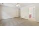 Large bedroom with neutral walls, plush carpet and ensuite access to bathroom at 3223 Polite Ln, Raleigh, NC 27610