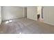 Neutral bedroom with plush carpeting and an attached bathroom at 3223 Polite Ln, Raleigh, NC 27610