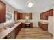 Well-lit kitchen featuring stainless steel appliances, plenty of cabinets, and lots of counter space at 3223 Polite Ln, Raleigh, NC 27610