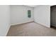 Cozy bedroom with carpet flooring, a window, and closet at 3705 Cassaro Ln, Zebulon, NC 27597