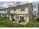 The property showcases a well-maintained backyard with a patio perfect for entertaining and relaxation at 4024 Dunkirk Dr, Burlington, NC 27215