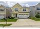 Charming two-story home with a well-manicured lawn and a two-car garage, perfect for suburban living at 4024 Dunkirk Dr, Burlington, NC 27215