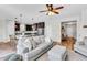 Bright, open living space flows to the kitchen, showcasing modern finishes and inviting decor at 4024 Dunkirk Dr, Burlington, NC 27215