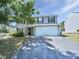 Charming two-story home with a two-car garage and well-maintained front yard at 4126 Amber Stone Way, Durham, NC 27704