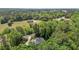Expansive wooded acreage with two residences offers privacy and natural beauty at 4225 Old Lewis Farm Rd, Raleigh, NC 27604