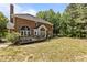 Backyard view from home's deck, ideal for outdoor entertaining and relaxation at 4225 Old Lewis Farm Rd, Raleigh, NC 27604