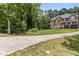 Beautifully situated home in a peaceful wooded setting, offering privacy and charm at 4225 Old Lewis Farm Rd, Raleigh, NC 27604