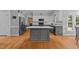 Beautiful kitchen featuring a large island, granite countertops, and modern appliances at 4225 Old Lewis Farm Rd, Raleigh, NC 27604