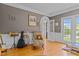 Cozy living room with hardwood floors, soft lighting, and comfortable seating at 4225 Old Lewis Farm Rd, Raleigh, NC 27604