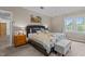 Comfortable main bedroom with natural light, stylish decor, and a cozy ambiance at 4225 Old Lewis Farm Rd, Raleigh, NC 27604