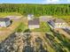 New construction homes are on large lots and nestled in a forested neighborhood at 482 Olivia Crossing Ct, Four Oaks, NC 27524