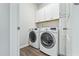 Bright laundry room featuring modern washer and dryer at 482 Olivia Crossing Ct, Four Oaks, NC 27524