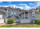 Apartment exterior featuring multiple levels of units and a grassy area at 4907 Hollenden Dr # 106, Raleigh, NC 27616