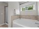 Bathroom features a soaking tub and a separate shower at 5 Cinnamon Teal Way, Youngsville, NC 27596