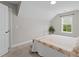 Bedroom with neutral walls, a window providing natural light, and carpeted floors at 5 Cinnamon Teal Way, Youngsville, NC 27596