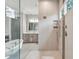 Bright bathroom showcasing a glass shower and vanity at 5125 Avalaire Oaks Dr, Raleigh, NC 27614