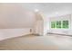 Spacious bedroom features a large window with a window seat and ample natural light at 5125 Avalaire Oaks Dr, Raleigh, NC 27614