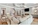 Open-concept living room offering great natural light, fireplace, and seamless flow to other areas at 5125 Avalaire Oaks Dr, Raleigh, NC 27614
