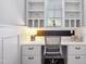 Bright, dedicated office space with built-in desk, storage, and shelves at 5125 Avalaire Oaks Dr, Raleigh, NC 27614