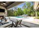 Expansive pool area with lounge chairs and umbrellas, perfect for outdoor relaxation and entertainment at 5125 Avalaire Oaks Dr, Raleigh, NC 27614