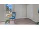 Bright entryway featuring modern laminate flooring, a comfortable chair, and a view of the outdoors at 623 Lincoln Dr, Kenly, NC 27542