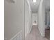 Hallway features grey walls, grey flooring and multiple doorways with views to other rooms at 623 Lincoln Dr, Kenly, NC 27542