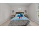 Cozy bedroom with a comfortable queen bed, stylish side tables, and a bright window at 623 Lincoln Dr, Kenly, NC 27542