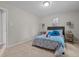 Inviting bedroom with a queen-size bed, charming side tables, and a cheerful ambiance at 623 Lincoln Dr, Kenly, NC 27542