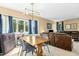 Open living room features lots of natural light with dining area and comfortable furnishings at 700 Martin Luther King Jr Blvd # A6, Chapel Hill, NC 27514