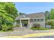 A charming pool house with a red door, offering a covered area for residents to enjoy the pool amenities at 700 Martin Luther King Jr Blvd # A6, Chapel Hill, NC 27514