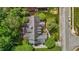 Aerial view of a home with a gray roof and manicured landscaping at 708 Mill Pointe Way, Elon, NC 27244