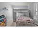 bedroom with bunkbeds, decorative accents, and carpeted floors at 708 Mill Pointe Way, Elon, NC 27244