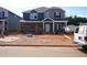 New two story home under construction showing garage, blue siding, and covered porch at 729 Deschutes Dr, Garner, NC 27529