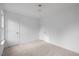 Bright bedroom with neutral carpet and clean, white walls at 8004 Mill Bluff Ct, Raleigh, NC 27616