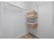 Walk-in closet featuring built in adjustable shelving at 8004 Mill Bluff Ct, Raleigh, NC 27616