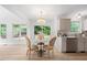 Bright breakfast area with stylish table and chairs, and natural light at 8004 Mill Bluff Ct, Raleigh, NC 27616